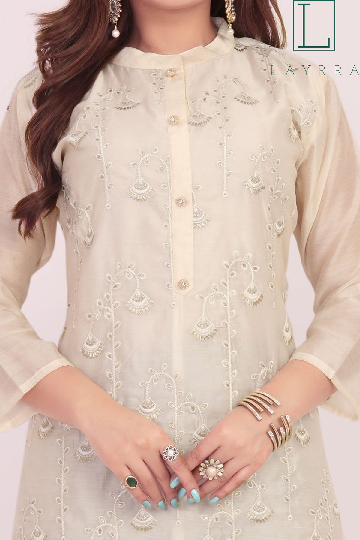 Women Cream Colored Ethnic Floral Embroidered Kurta with Trousers