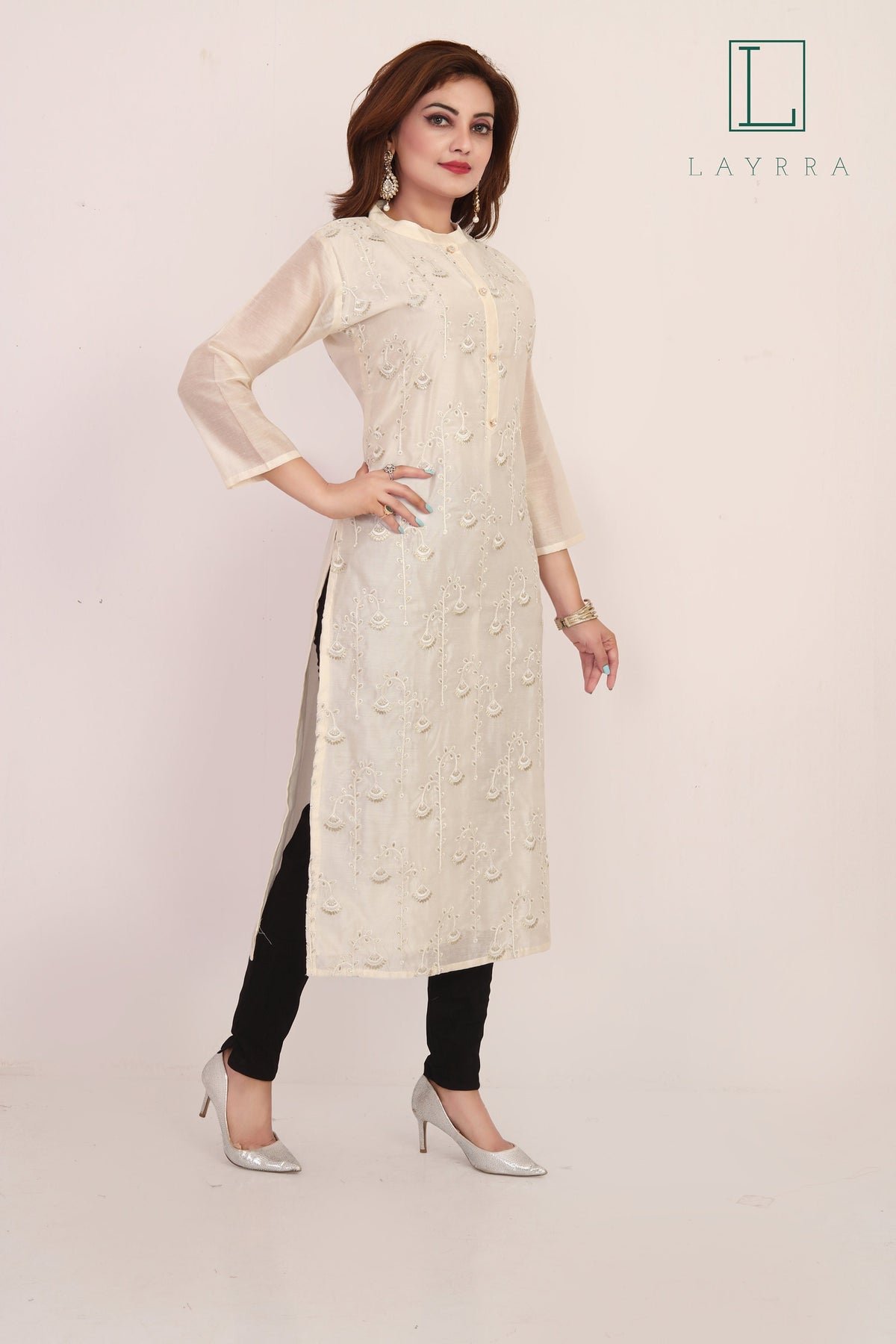 Women Cream Colored Ethnic Floral Embroidered Kurta with Trousers
