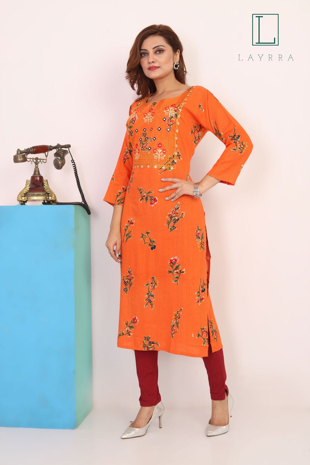 Women Orange Ethnic Floral Print Embroidered Mirror work Kurta with Trousers