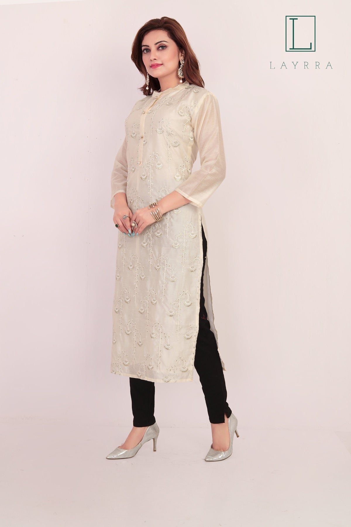 Women Cream Colored Ethnic Floral Embroidered Kurta with Trousers